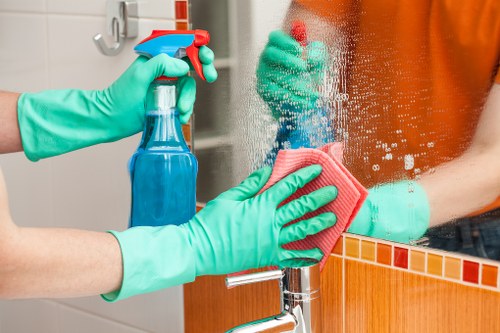 Local technician cleaning stairs and hallway carpets in Hollandpark